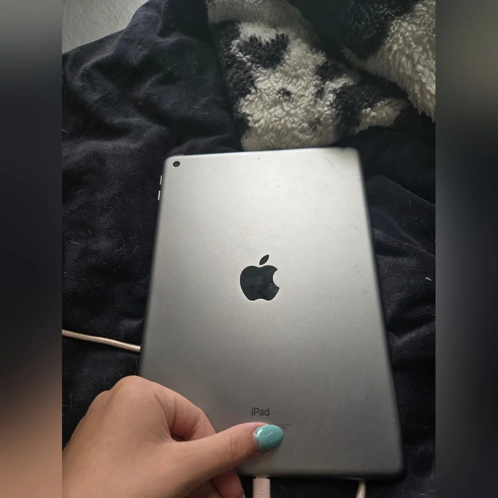 Apple iPad 5th Genetaction with Silver and Black Frame